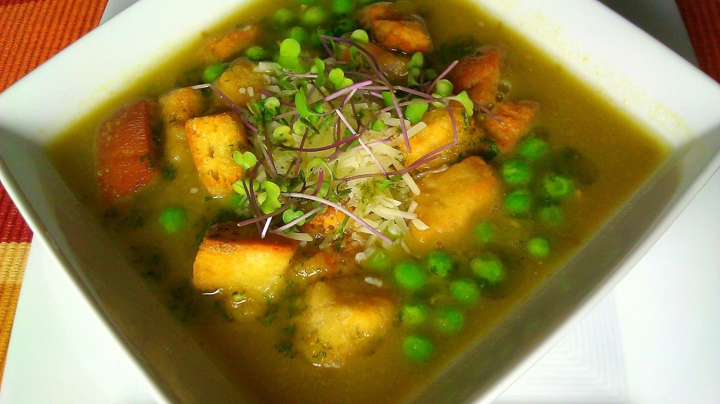 Pea Soup Drizzled with Cilantro Oil, Garnished with Kale Micro-Greens, Parmesan and Croutons