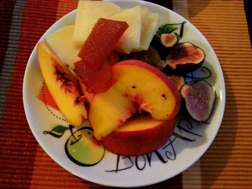 Manchego cheese with fresh fruit and quince paste for dessert