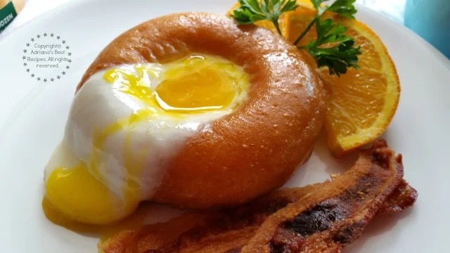 https://www.adrianasbestrecipes.com/wp-content/uploads/2015/06/Heavenly-bite-is-this-Sunny-Side-Up-Doughnut-breakfast-recipe.jpg.webp