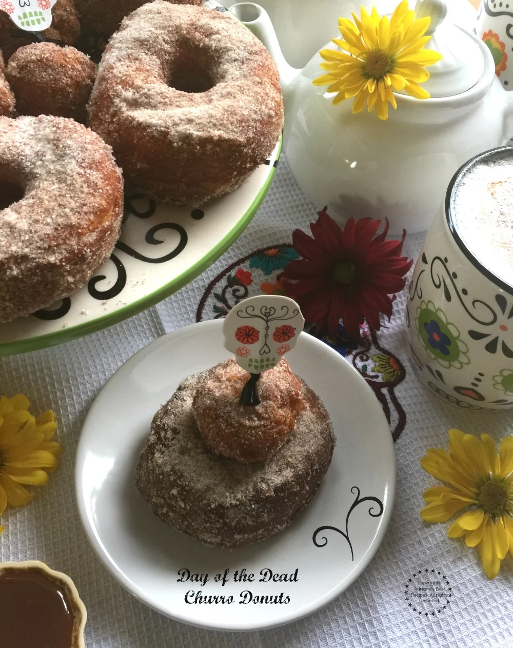 Day of the Dead churro donuts paired with dulce de leche and frothy hot chocolate