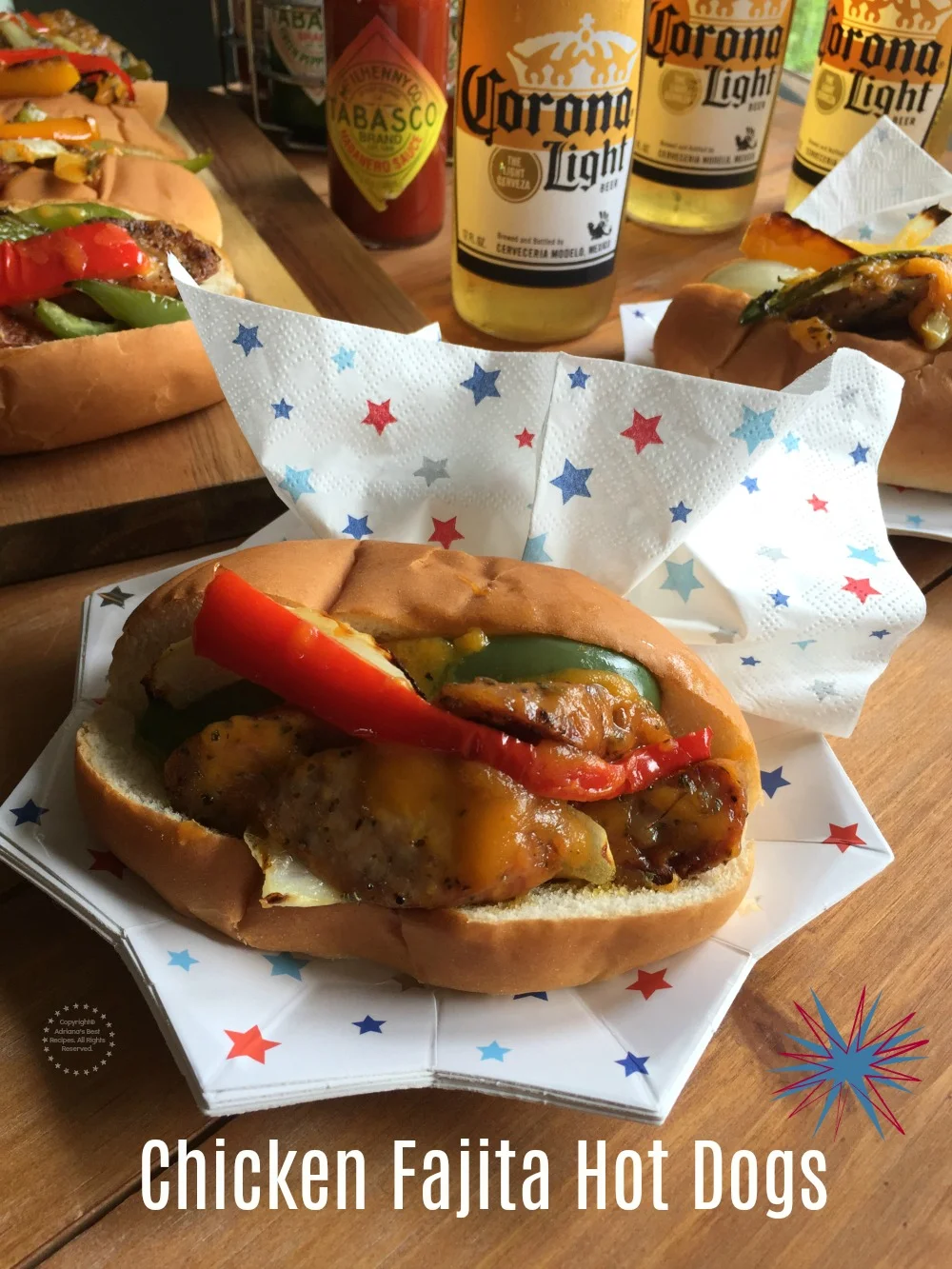 Chicken fajita hot dogs served on a patriotic star plate paired with beer