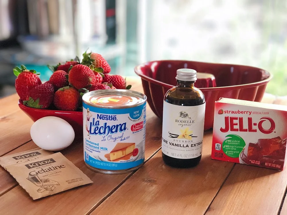 https://www.adrianasbestrecipes.com/wp-content/uploads/2019/02/Ingredients-for-making-the-Strawberries-N-Cream-Jello.jpg.webp