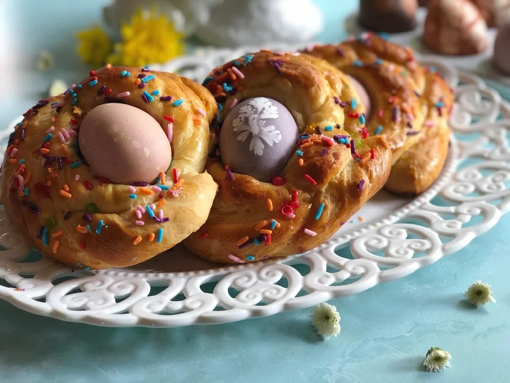 European Easter bread with naturally colored Easter Eggs and sprinkles