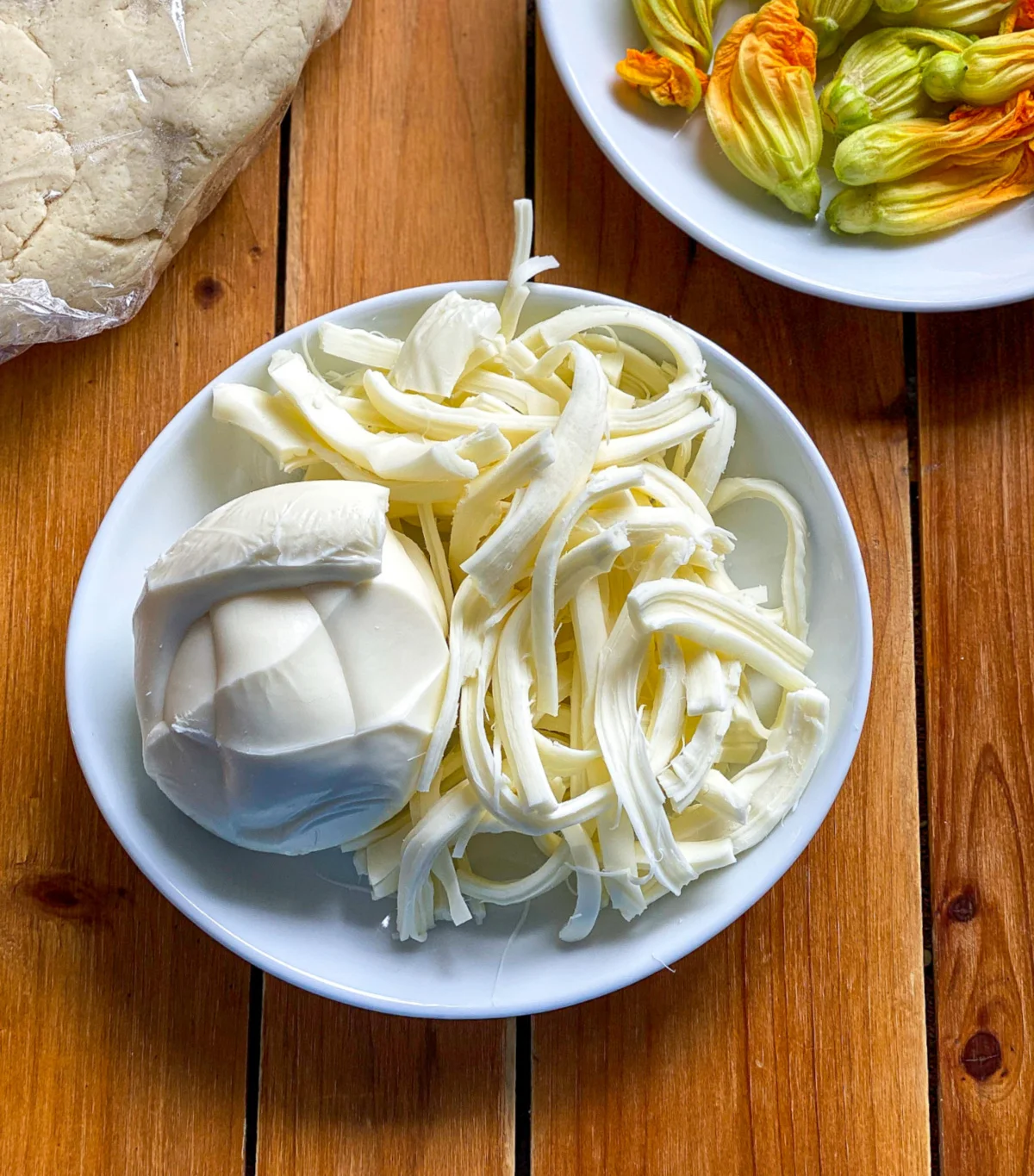 queso Oaxaca on a white plate